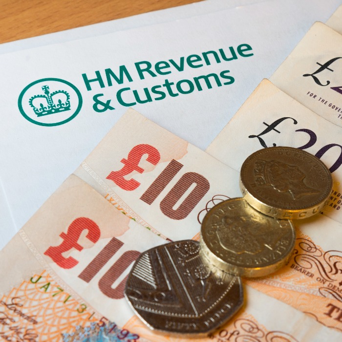 HM revenue and customs letter with money