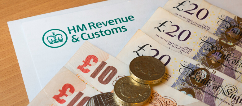 HM revenue and customs letter with money