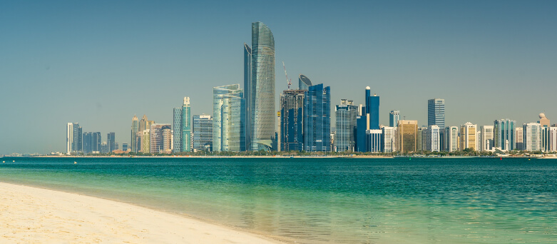 Abu Dhabi beach and city skyline