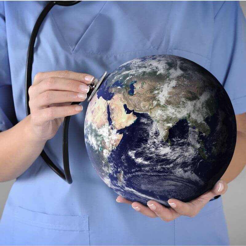 Doctor holding the planet