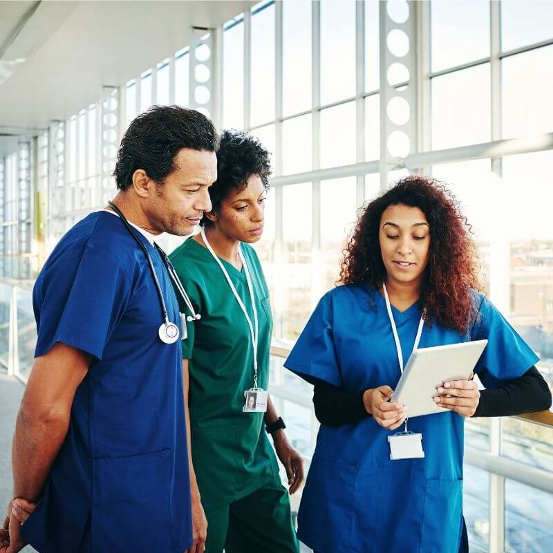Doctors discussing charts