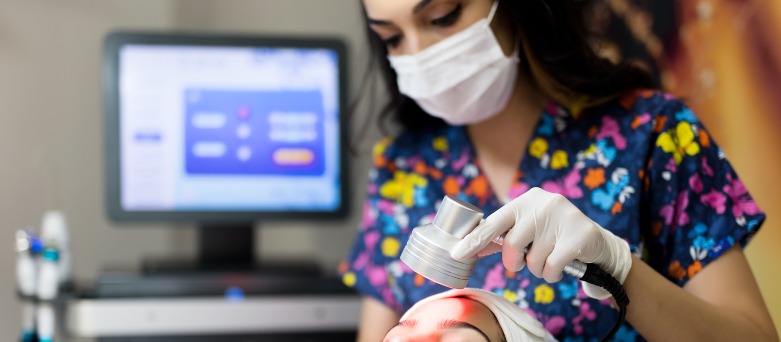 Female dermatologist consulting with a female patient