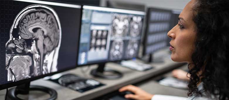 Radiologist examining a scan