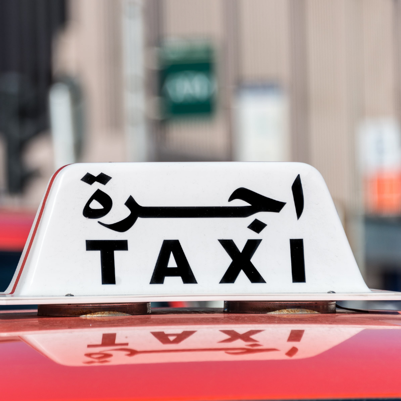 Taxi sign in English and Arabic in Saudi Arabia
