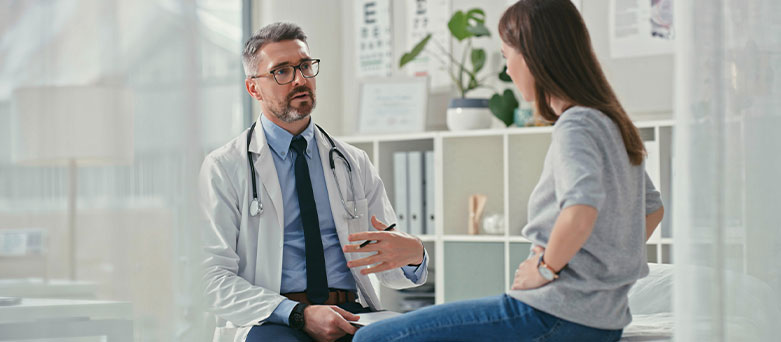Gastroenterology consultant with a patient