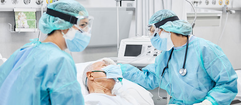 ITU Nurse with a patient