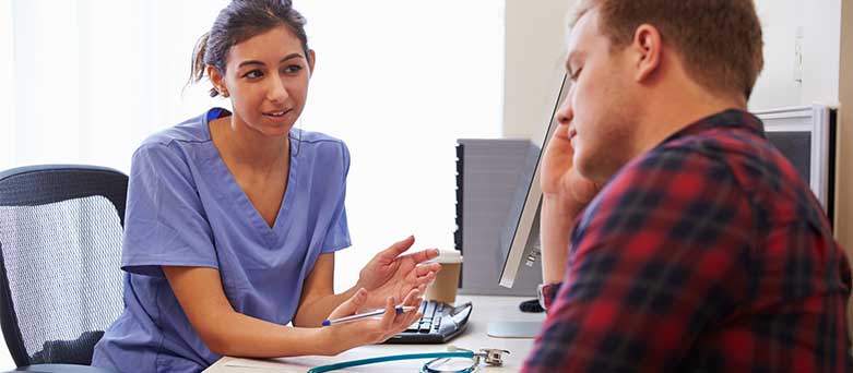 Mental health nurse with a patient